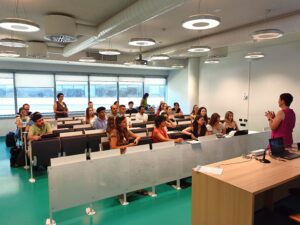Students and academics take part in a classroom session at the University of Turin