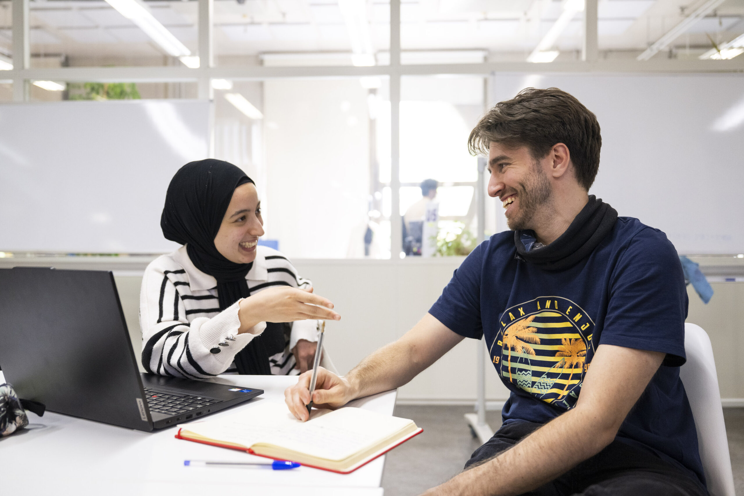 Two university students laughing